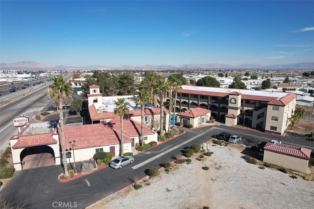We are proud to present for sale the Mariposa Inn, a 94-room hotel fronting the I15 Freeway. This three-story hotel is conveniently located just off the I-15 freeway and caters to both business and leisure travelers. The property is situated on a larger ±2.89 acre lot and is highly visible from the I15 freeway. This hotel serves guests traveling to and from Las Vegas as well as guests dealing with major businesses in the area such as SCLA, Global Logistics Center, Big Lots Distribution Center, The Boeing Company, General Atomics, Wal-Mart Distribution Center, Goodyear Tire Distribution Center, and ConAgra Foods, Inc. All of these companies provide a steady stream of potential guests.