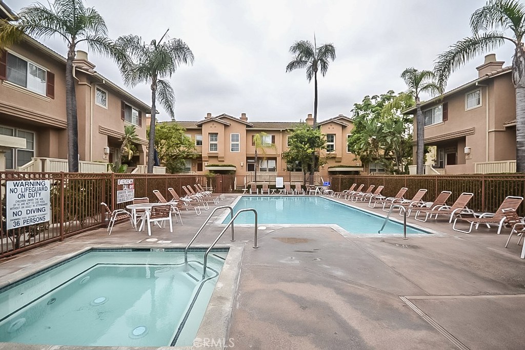 BEAUTIFUL RESORT LIKE LIVING IN THIS NICE TRI-LEVEL END UNIT TOWN HOME LOCATED IN THE PRIVATE GATED COMMUNITY OF SUMMERWIND TOWNHOMES OF ANAHEIM, FIRST LEVEL FEATURES THE 2 CAR GARAGE, LAUNDRY ROOM & CARPETED BONUS ROOM(CAN BE A ROOM), MID-LEVEL HAS THE LIVING ROOM ON HARDWOOD FLOORS W/ COZY FIREPLACE, DINING, REMODELED KITCHEN & 1/2 BATH ON CERAMIC TILE FLOOR, BALCONY & DECK FOR ENTERTAINING, THE SPACIOUS MASTER BEDROOM & 2 OTHER BEDROOMS & HALLWAY BATH ON CERAMIC TILE FLOOR. AMENITIES INCLUDE POOLS, SPAS, WELL MAINTAINED COMMON AREAS & LANDSCAPE. LOTS OF PARKING, EXTRA PARKING WITH PERMIT FROM HOA. CLOSE TO SHOPS, FREEWAYS, RESTAURANTS,DISNEYLAND,ANAHEIM CONVENTION CENTER, & LA ANGELES STADIUM,NEW PAINTED AND PROFESSIONALLY CLEANED FOR MOVE-IN.!!!