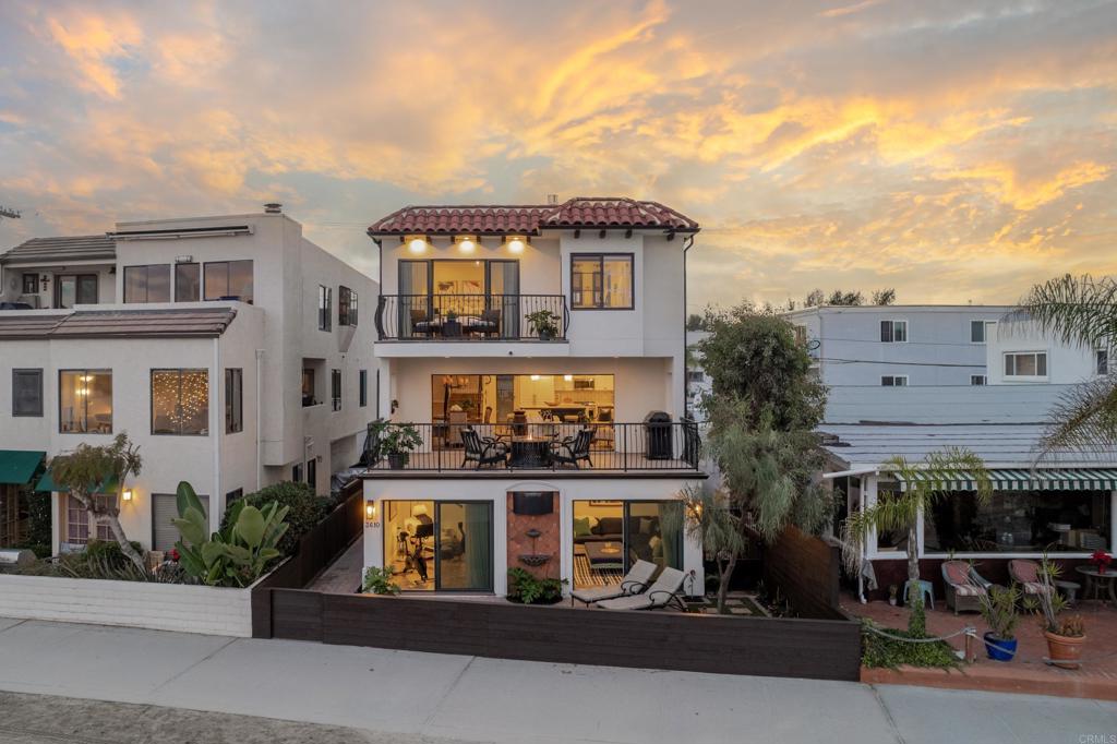 First time on the market! Rare opportunity to purchase a bay front single family property. This Spanish-style home was thoughtfully designed and built in 2014 with modern living in mind. No expense was spared when building this magnificent residence. Open concept floorplan with disappearing sliding glass doors brings the outside in, facilitating a seamless expansion of the great room while capturing the breathtaking panoramic water views. 5 Bedrooms, 4 Bathrooms plus family room. Two-car attached garage with Tesla charger and two additional (tandem) parking spaces. Additional features; outdoor shower, custom light fixtures throughout, luxury vinyl planking, sound system, newer solar system with 26 panels, 5 mini splits (one in each bedroom), wall bed bunk bed system in the office/guest room. Designed by architect Tim Golba and built by Redline Construction.