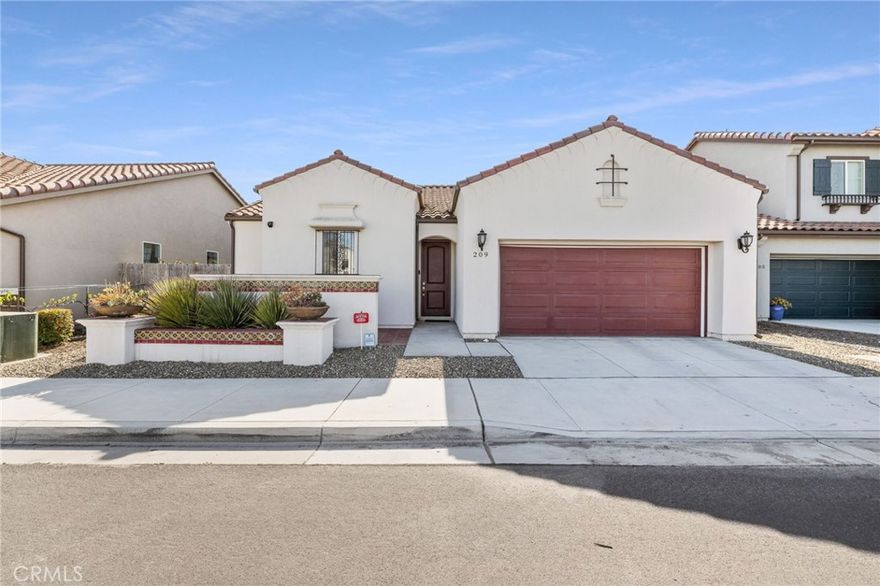 Don't miss your opportunity to own this iconic Pasdera home at 209 Ninos Drive in Guadalupe. It is an artfully designed custom-built home and showcases the most beautiful upgrades throughout. The open floor plan is perfect for entertaining, featuring a bright and airy contemporary-style kitchen with polished quartz countertops, and a beautiful mosaic backsplash. Other features include hand-textured walls throughout the home including the garage and calacatta marble floors in the bathrooms. This home is centrally located in Guadalupe with the Historic CA Highway 1 that runs through the town, it is just minutes to the Guadalupe Dunes Beach, hiking trails, nature walks, wine tasting, and great restaurants. Qualifies for USDA, FHA, and VA financing.