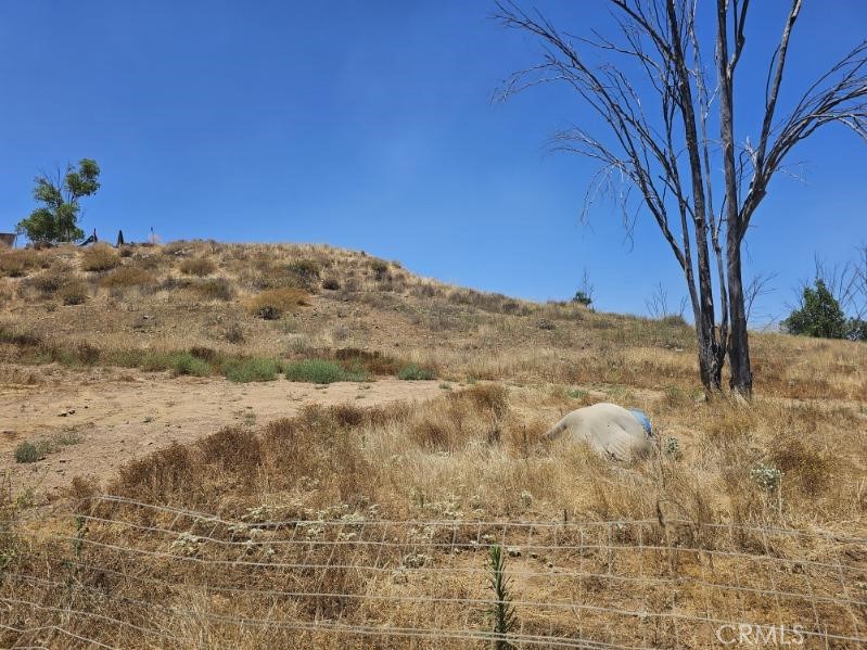 Build your own dream Home! Horse Property consisting of 2.27 ACRES of land in Perris. Mountain Views. Near Restaurants & Convenient Stores.