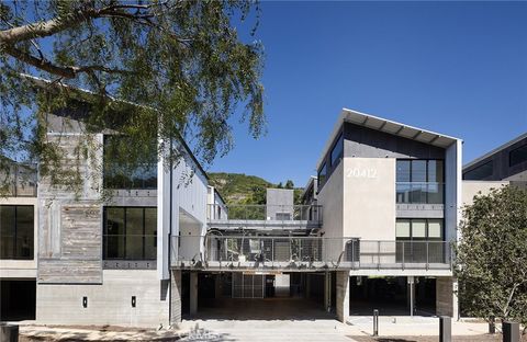 Photo of 20412 Laguna Canyon Road #214, Laguna Beach, CA 92651 (MLS # LG22102889)