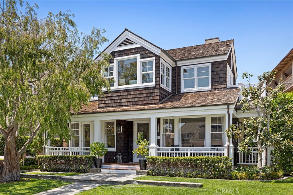 Gorgeous Cape Cod architecture located in the ultra-desirable, gated, waterfront community of Bayshores. Coveted Bayshore Drive location, ideally positioned within steps of the private main beach, sand volleyball and guest dock. Seldom does a home with this quality, style and location come to the market in Bayshores. Sunny, southwesterly exposure allows for an abundance of natural light to flood into the home and onto the front deck where there are peek-a-boo views of the beach and harbor. Designed for California living, this 4 bedroom, 4.5 bath home is beach living at its best! As you first enter, you will notice the high ceilings, timeless hardwood flooring, wainscoting, formal living room with cozy fireplace and dining room with French doors opening to the veranda. Enjoy entertaining in the great-room, with informal dining area with built-in seating, chef’s kitchen with 2 large kitchen islands and family-entertainment media room with fireplace. The family great-room opens to the sunny, private patio and lends itself to indoor-outdoor living year around. Enjoy the convenience of a first-floor bedroom with views to the lovely patio and garden. The second level encompasses three large bedrooms with vaulted ceilings and en-suite baths. Boasting a formal entry, the stunning master suite includes a sitting area with fireplace and peek-a-boo views of the beach and harbor. Soaring beamed ceilings showcase the master bath with separate bathtub, walk-in shower, dual vanities and massive walk-in closet, which has direct access to the large laundry room. Very rare opportunity to live in such close proximity to the Bayshores Swim Beach! Bayshores is one of Newport Harbor’s most sought after, waterfront neighborhoods with its 24-hour gated and secured entrance, spectacular harbor and turning basin views, tree-lined streets, two wide sandy bay beaches, private yacht marina, children’s park and private entrance to the neighboring Balboa Bay Club. There are friendly neighborhood activities for all ages, and it is a place where security allows for children to play on the streets and roam carefree. Come and live the Bayshores lifestyle! Keep on the lookout for more photos coming soon!