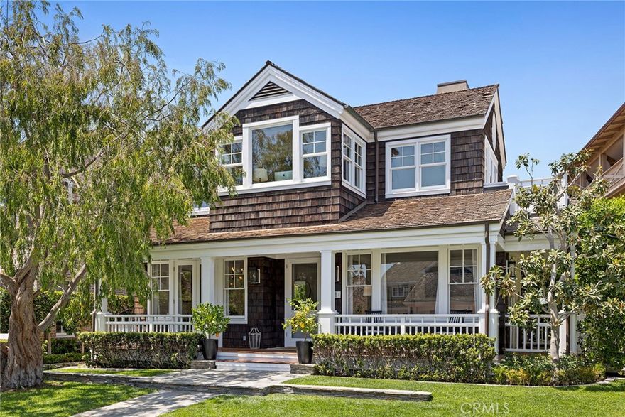 Gorgeous Cape Cod architecture located in the ultra-desirable, gated, waterfront community of Bayshores. Coveted Bayshore Drive location, ideally positioned within steps of the private main beach, sand volleyball and guest dock.  Seldom does a home with this quality, style and location come to the market in Bayshores.  Sunny, southwesterly exposure allows for an abundance of natural light to flood into the home and onto the front deck where there are peek-a-boo views of the beach and harbor.  Designed for California living, this 4 bedroom, 4.5 bath home is beach living at its best!  As you first enter, you will notice the high ceilings, timeless hardwood flooring, wainscoting, formal living room with cozy fireplace and dining room with French doors opening to the veranda.   Enjoy entertaining in the great-room, with informal dining area with built-in seating, chef’s kitchen with 2 large kitchen islands and family-entertainment media room with fireplace.  The family great-room opens to the sunny, private patio and lends itself to indoor-outdoor living year around.  Enjoy the convenience of a first-floor bedroom with views to the lovely patio and garden.  The second level encompasses three large bedrooms with vaulted ceilings and en-suite baths. Boasting a formal entry, the stunning master suite includes a sitting area with fireplace and peek-a-boo views of the beach and harbor.  Soaring beamed ceilings showcase the master bath with separate bathtub, walk-in shower, dual vanities and massive walk-in closet, which has direct access to the large laundry room.  Very rare opportunity to live in such close proximity to the Bayshores Swim Beach!  Bayshores is one of Newport Harbor’s most sought after, waterfront neighborhoods with its 24-hour gated and secured entrance, spectacular harbor and turning basin views, tree-lined streets, two wide sandy bay beaches, private yacht marina, children’s park and private entrance to the neighboring Balboa Bay Club. There are friendly neighborhood activities for all ages, and it is a place where security allows for children to play on the streets and roam carefree.  Come and live the Bayshores lifestyle!  Keep on the lookout for more photos coming soon!