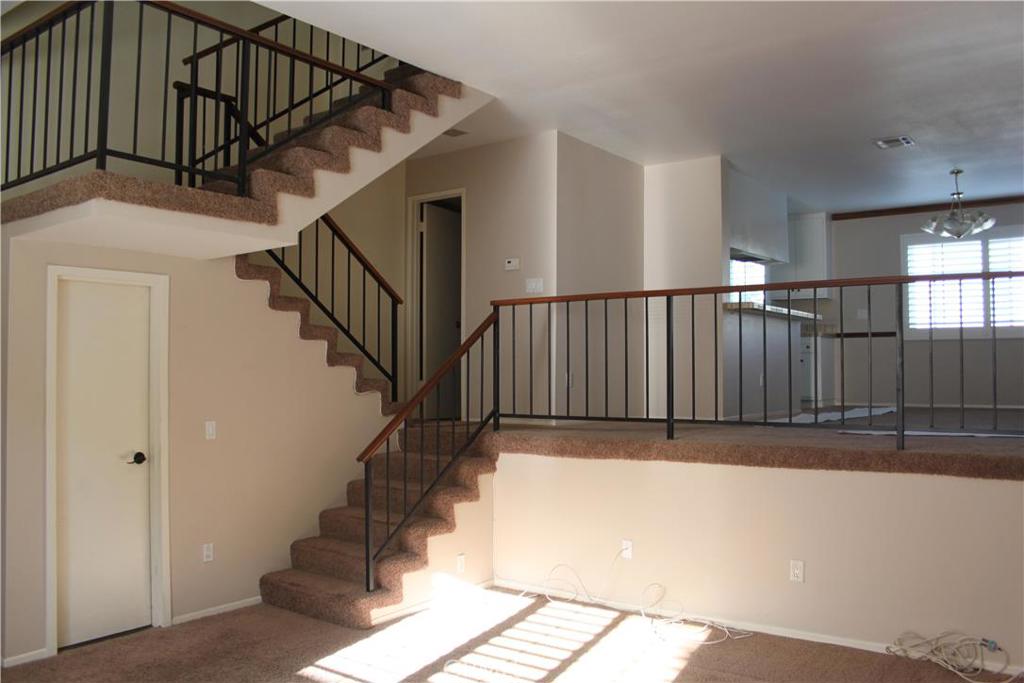 Run, don't walk to your new home! This great town-home is conveniently located near the freeways, shopping and great schools. This beautiful home features Plantation Shutters and Dual-Paned windows throughout! Newer carpet and tile flooring, newer water heater, newer A/C. Family room leads you to your own private patio with garden. Galley Kitchen looks onto the large separate dining area. Remodeled guest bath on main floor. Master bedroom has walk in closet and large bathroom with separate shower and tub. Second bedroom has walk in closet and is nicely sized. The laundry area is also perfectly located upstairs and will fit most larger size washer and dryers. This home boasts pride of ownership and has been well maintained. This charming community also features a clubhouse with kitchenette, large, gated swimming pool and spa area, perfect for entertaining! There is plenty of permitted guest parking as well as street parking! Don't let this one get away!