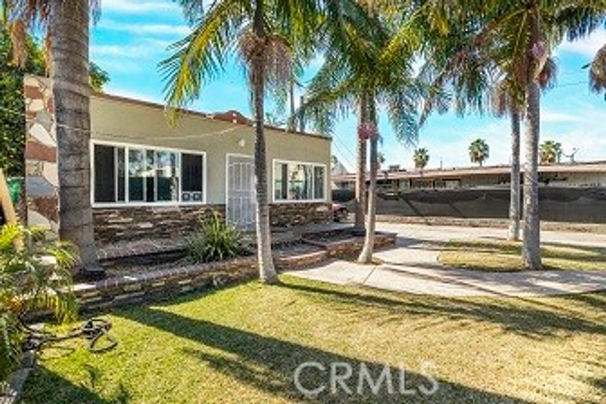 Welcome to Lynwood! This Single Family Residence that has two beds and one bath with a bonus remodeled workshop (350) with permits in the back that has  990 square feet is a must see!! Open floor plan with living room and kitchen countertops, an island, custom cabinets, dishwasher, and recessed lights and newly windows. The master bedroom includes a walk-in closet with a built-in closet organization system. This gorgeous property has a bonus washer and dryer room that leads to the side patio and workshop that can also be used for mother in law quarters or extended family. It features a large front and back concrete patio with gorgeous palm trees that gives more privacy to the home for relaxing and enjoying your morning coffee. Laminated flooring throughout the home with a long driveway that can accommodate up to three cars. The back patio shed has plenty of space to house your pets. This home is across the street from Hellen Keller Elementary School and near Long Beach Boulevard. A must see every Thursday by appointment only!!