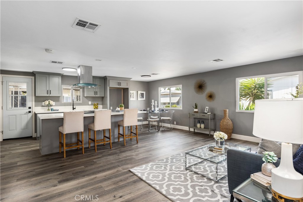 Whole-home remodel completed 9/2020. Want to live near the major attractions of Orange County? Located with easy access to 5/57/22/91/55 freeways this Park Royale home is ready to move in. The home features an open design living area and was completely remodeled, adding energy-efficient double-pane windows, a new modern kitchen with brand new appliances and quartz countertops, waterproof wide-plank flooring, energy-saving LED lighting, and new quartz top bathroom vanities. The third bedroom could be an excellent work-from-home office. Incredible location close to Angels, Ducks, Disneyland, Anaheim Convention Center, Entertainment, and an abundance of dining choices. If hanging out at home is more your speed, spend time on your covered porch or make the back patio into your own oasis. This home is ready for you to move in quickly.
