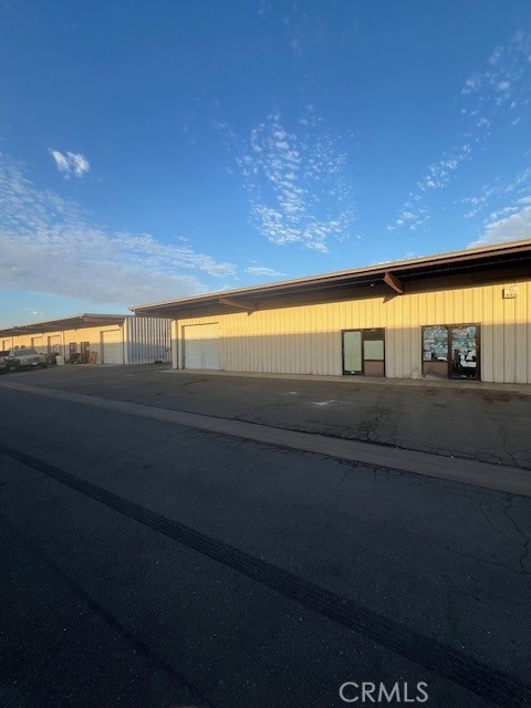 2,500 SF of Fully insulated and sprinklered shop space with roll-up door for vehicle and equipment access. Has a small office and an ADA compliant restroom. Space has natural gas fired space heating and evaporative cooling and is within a fenced yard area with some shared covered parking. Owner would prefer a minimum 3 to 5-year lease term but is negotiable. Located in the Merced Airport Industrial Park and within close proximity to the Airport Terminal. Property is zoned I-L-(Light Industrial). Note 1,500 SF space may be available soon as well
