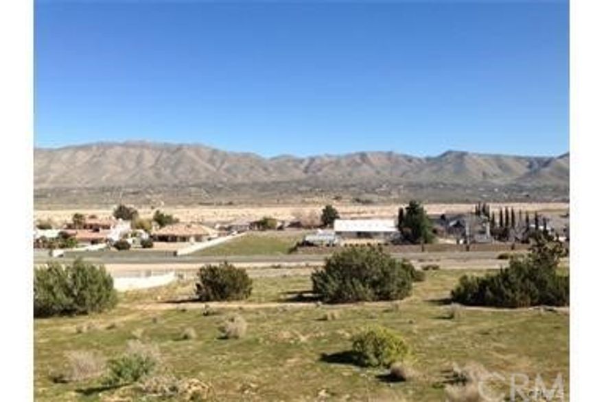 Huge lot near Hesperia Lake.  Gorgeous panoramic view of the desert and mountains.  Large newer homes in the area.