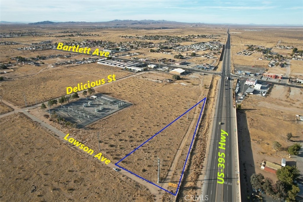 For sale 1.4 acres zoned mixed use (commercial and multi family) located on NW corner of Hwy US-395 and Lawson Ave. Has Billboard signage. Caltran proposed signal light intersection at Lawson Ave. & Hwy 395. Water, Power and Sewer close by (buyer to verify). Great location. Fronting Hwy 395. APN # 0459-181-02-0000. NOTE: Ground lease is available Base rent $80,000/year + NET.