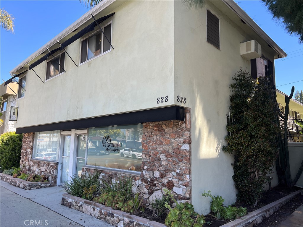 This well-maintained mixed-use building features two highly visible, street-facing commercial units on the ground floor—ideal for attracting foot traffic and business exposure. Above, you'll find eight thoughtfully designed residential units, including two spacious 2-bedroom apartments and six comfortable 1-bedroom units, offering strong rental income potential.
Convenient alley access leads to four private garage spaces, providing valuable off-street parking. Recent upgrades include brand-new electrical panels installed in 2025, refreshed aesthetics in the laundry room, and certified stairs and balconies for safety and compliance. The roof was completely replaced, enhancing both structural integrity and energy efficiency. Additional improvements, including selective stucco repairs, further elevate the property’s appeal and long-term value.