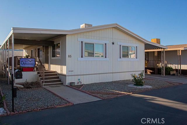 This Spacious mobile home offers 2 Bedrooms and 2 Full Bathrooms. The current owner has gone through the home from top to bottom to make sure this home is in great conditions for the new owner. Kitchen and both bathrooms have been repainted along with the outside of mobile. Mater bedroom has HUGE walk-in closet and Master Bath has a nice Walk-In Shower. The roof is only 4 years old and all windows in the home have all been replaced to double pane energy efficient windows. This home is in a nice peaceful 55+ Community and close to the 15 freeway and shopping. Association Amenities: Carport, Laundry # of RV Spaces: 0 Special Features: Storage ShedFRON Lot Location Type: Standard Location FireplaceFeatures: None Pool Features: Common Pool Spa Features: Common Spa Zoning: Residential 1 # of Attached Spaces: 0 # of Detached Spaces: 0 # of RV Spaces: 0