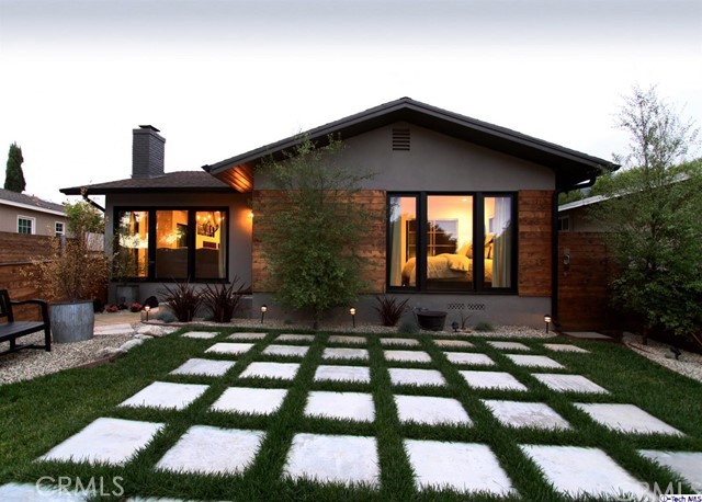 The perfect blend of style, convenience & rustic modern luxury in a highly sought after pocket of NE Pasadena! Inviting, beautiful & bright, every inch of this 3 bed, 2 bath, single story home has been painstakingly transformed into a true masterpiece. It offers an amazing open layout that flows seamlessly from room to room & boasts stunning designer finishes in every direction. Music will fill the home on the surround sound system while friends & family gather around the oversized island in your sleek, gourmet chef's kitchen (updated w/ high-end finishes & Wolf / Sub Zero appliances) all while overlooking roaring fires in the adjacent open family & living rooms. In the evenings you'll escape to a luxurious master retreat w/ a lavish spa-like master bathroom, giant walk-in closet and a private outdoor seating area. The expansive backyard is a private entertainer's paradise that offers the enjoyment of both beautiful green grass and multiple resort-like lounge areas w/ fire pits & room for a pool. The oversized covered patio off of the garage has a fully equipped outdoor kitchen w/ top of line appliances and is ideal for summer BBQ's, cocktail parties or dining al fresco! ~ ll overlooked by the peaceful San Gabriel mountains.
