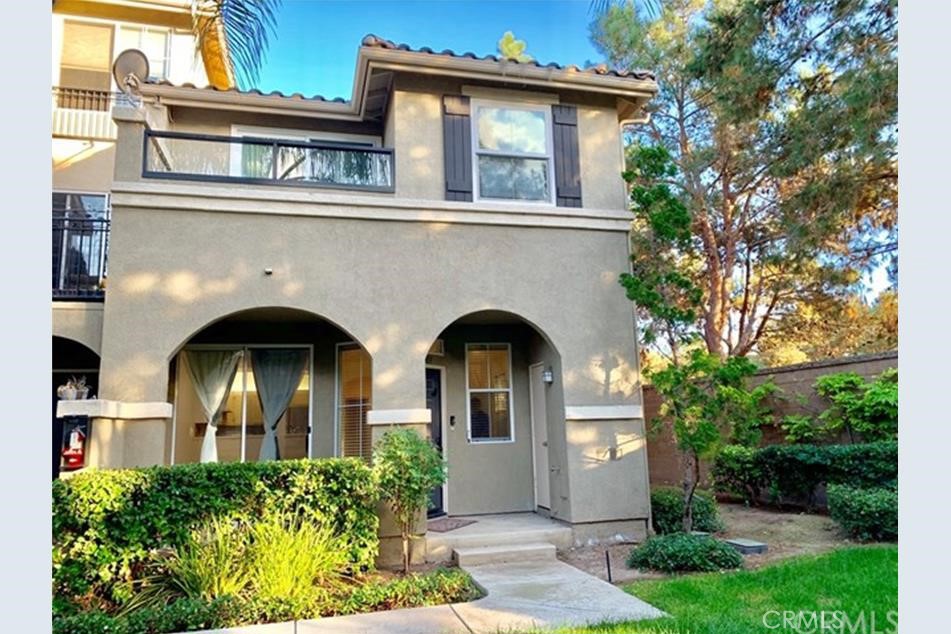 A nice end unit in Gated Oak Creek. This lovely townhome features two bedrooms, two and a half baths, a two-car garage, a front patio, and a sun-splashed balcony. The upstairs flooring has been recently upgraded, adding a touch of elegance to the home. The kitchen boasts ceramic tile countertops and a convenient dry-food pantry. The master suite includes a private balcony, a walk-in closet, and a master bath with dual vanities and a soaking tub - perfect for unwinding after a long day. Residents of Oak Creek have access to award-winning Irvine schools and resort-style amenities such as pools, spas, tennis and sports courts, and more. Plus, with upscale shopping and dining just a stone's throw away, you'll have everything you need right at your fingertips. Don't miss out on the opportunity to call this wonderful community your new home.