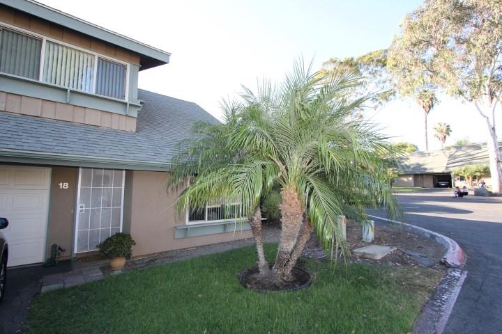 Desirable 3 bedroom 2 1/2 bath air conditioned corner unit in gated community with solar heated pool. High ceilings give this home an open airy feeling you're going to love. Upgrades to this beautiful home include gorgeous slab granite counters on maple cabinets, upgraded sinks & faucets in kitchen & bathrooms, laminate & tile floors, raised panel doors, dual pane vinyl windows & slider, brushed nickel mirrored closets. Great backyard with stylish stone slab covered patio, small lawn, apple & guava trees. Neighborhoods: Vista Complex Features: ,, Equipment: Range/Oven Other Fees: 0 Sewer: Sewer Connected Topography: LL