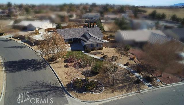 Large UPGRADED home sitting on a HUGE corner lot located in a very popular area close to award winning schools, Jess Ranch Market Place (best shopping & restaurants in the valley) & surrounded by large custom homes. This is a special and rare property with 2 RV gates, lots of concrete for RV/boat parking, full PROFESSIONAL LANDSCAPING, tile roof, 3 car attached garage with epoxy flooring & more! I love the covered porch & once you enter you'll love the tall vaulted ceilings, engineered wood floors, tall UPGRADED baseboards and massive windows that have great views of the backyard. Great for entertaining with living room, formal dining room & OVERSIZED family room with warm fireplace that is open to the kitchen. The kitchen layout is just perfect with GRANITE COUNTERS & BACKSPLASH, lots of counter space, & tons of storage! This home is in EXCELLENT CONDITION with large bedrooms & the master is something else..you must see! 2 covered patios, multiple fruit trees, garden and more! Association Amenities: None # of RV Spaces: 0 Special Features: ,,PTRYNONE Lot Location Type: Standard Location Special Features: Cable TV,Garage Door Opener # of Attached Spaces: 3 # of Detached Spaces: 0