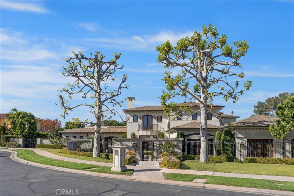 Nestled within a prestigious, guarded-gate community, this extraordinary 11,000 square-foot estate offers the perfect blend of luxury, privacy, and tranquil views. Adjacent to the serene Pacific Ocean and the renowned Pelican Hill Golf Course, this residence exudes elegance and sophistication at every turn. A private driveway leads to a spacious 4-car garage, ensuring both convenience and exclusivity. Inside, you'll discover six expansive bedrooms, including two large guest suites and a primary suite with retreat that rivals a five-star resort. With total of ten bathrooms and powder rooms, this home provides both style and function, while the grand library with custom wooden bookshelves offers a peaceful sanctuary for reading or working.
The formal living and dining rooms are perfect for hosting sophisticated gatherings or intimate moments, while the custom kitchen, equipped with top stainless steel appliances and custom cabinetry, is a chef’s dream. Multiple French doors open directly to the resort-style backyard, where a sparkling pool, pool house, and second kitchen create an entertainer’s paradise. Whether you’re relaxing by the rooftop courtyard fireplace or enjoying a movie in the entertainment room, every detail has been carefully designed for ultimate comfort and enjoyment. For wellness enthusiasts, a gym and sauna room complete the luxurious lifestyle. Experience the relaxing escape with a private resort-style backyard and exclusive access to the beach within the community.
Beyond the gates of this remarkable home, you'll find yourself surrounded by upscale shopping, world-class dining, and the renowned Pelican Hill Resort. Crystal Cove State Park and Beach are just a short walk away, offering the perfect coastal retreat. This estate is not just a home—it's a lifestyle, offering unparalleled access to oceanfront living, world-class golf, and the finest of California living.