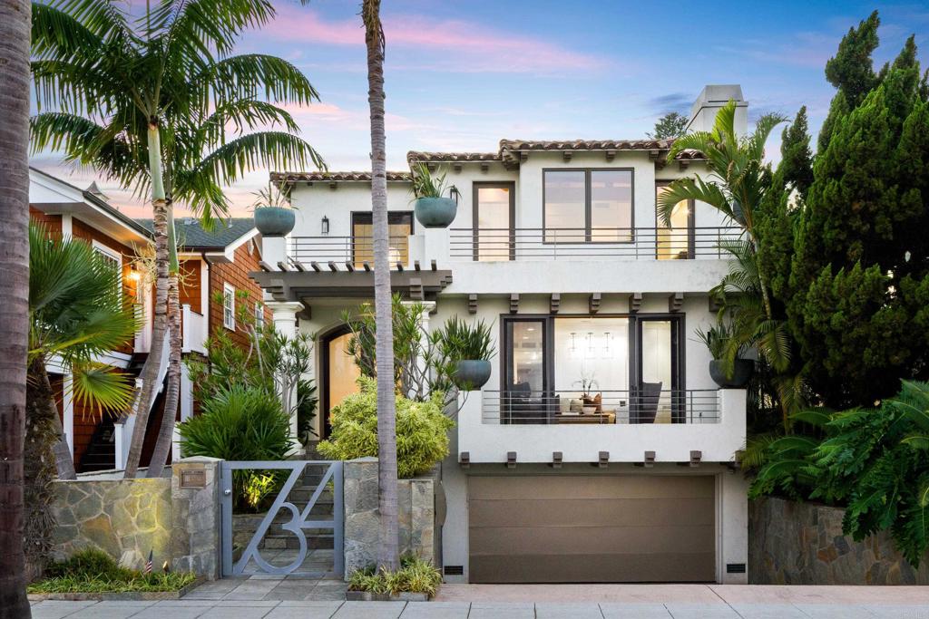 One-of-a-kind Contemporary Coronado Island home has been reimagined. Every detail has been addressed with superior design, materials, and workmanship, including a state-of-the-art Control4 Smart System, custom white paneled walls, Brazilian hardwood flooring, custom cabinetry, top-of-the-line appliances, and premium finishes throughout. The main living areas open to the backyard by way of pocket doors incorporating the outside into living, dining, and kitchen areas. The private lushly landscaped backyard encompasses an Italian glass tiled pool/spa, firepit, entertainment pavilion, and a 1bd/1ba pool house/casita. The open and bright 3/bd/3b main home has two master suites with private decks. The primary master suite features a spa-like bathroom with high-end finishes and an expansive high-end boutique-style closet. Enjoy views of the Coronado Bridge, City Lights, and the bay. Walking distance to Hotel Del Coronado, multiple local shops, and an abundance of cafes and restaurants throughout the Village. This is the ultimate Island dream home getaway.