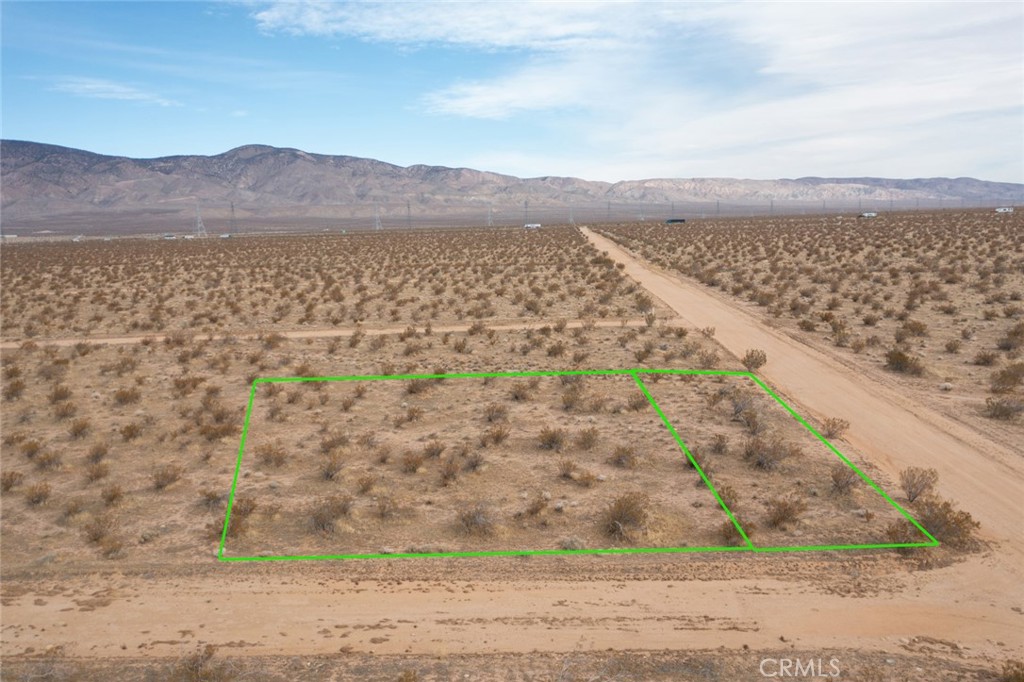Features: Corner lot, desert and mountain views, wide open spaces. Mojave USD Schools. Room to build your dream retreat, new home, guest house, ADU, or all of the above. . .it's up to you. Great Location: Quick Highway access, 15 minutes to shopping and restaurants, just north of Mojave Air & Space Port, close to Edwards AFB. Endless possiblities!