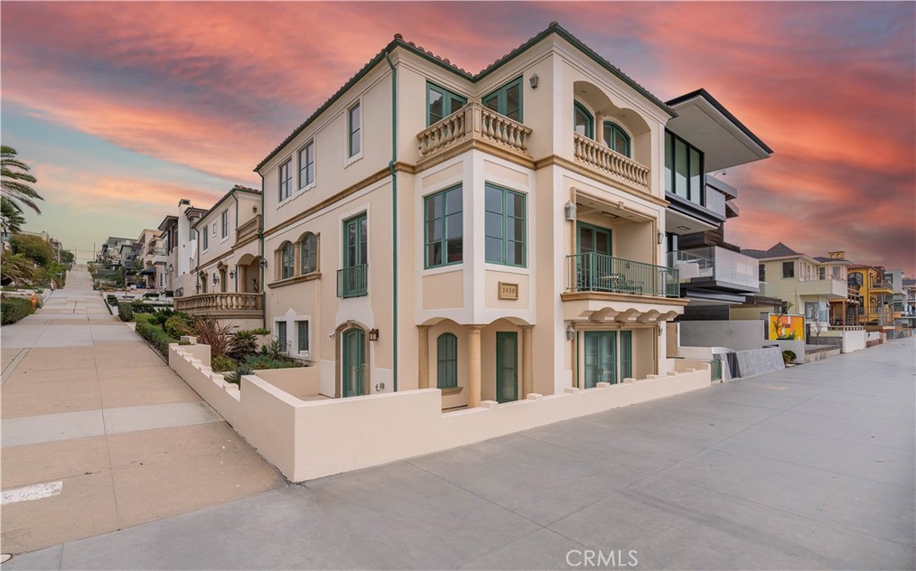 Welcome to your slice of paradise on The Strand in the heart of Manhattan Beach, where coastal elegance meets Mediterranean charm in this breathtaking corner lot waterfront residence. Nestled in one of the most coveted locations in Manhattan Beach, this stunning home features a separate 2 bedroom, 2 bath unit with its own 1 car garage. The main house is a 4-bedroom, 5-bathroom home with a 3-car garage. The home exudes luxury and sophistication at every turn. As you step inside, you're greeted by an open floor plan that seamlessly blends the indoors with the outdoors, creating a perfect space for entertaining and relaxation alike. The chef's kitchen is a culinary masterpiece, boasting high-end commercial-grade appliances that cater to the most discerning tastes. Ascend effortlessly between floors with the two-stop circular glass elevator, adding a touch of modern convenience to the timeless allure of the home. The entire third story is dedicated to the lavish master suite, offering unparalleled privacy and serenity with its expansive layout and panoramic views of the azure waters beyond. Wine connoisseurs will delight in the expansive wine cellar, a sanctuary for storing and showcasing your prized collection in impeccable style. Whether hosting intimate tastings or simply savoring a glass in solitude, this cellar is sure to be a cherished feature of the home. Warmth and ambiance permeate through the home with two cozy fireplaces, perfect for chilly coastal evenings spent with loved ones. Step outside into the inner courtyard patio, where a built-in BBQ invites al fresco dining amidst tranquil surroundings. The spacious ground level family room serves as the second heart of the home,providing a warm and inviting atmosphere for gatherings large and small. With seamless access to the outdoor living area, you'll find yourself effortlessly transitioning from indoor relaxation to outdoor enjoyment, where the gentle sea breeze and breathtaking views create an ambiance like no other. The outdoor living area is a true oasis, providing ample space for soaking in the California sun or hosting gatherings against the backdrop of sweeping 180-degree white water views. Just steps from the sand, where each day and every sunset brings a new opportunity to revel in the beauty of coastal living. Experience the epitome of luxury beach living in this exquisite waterfront home, where every moment is infused with the timeless charm of Manhattan Beach.