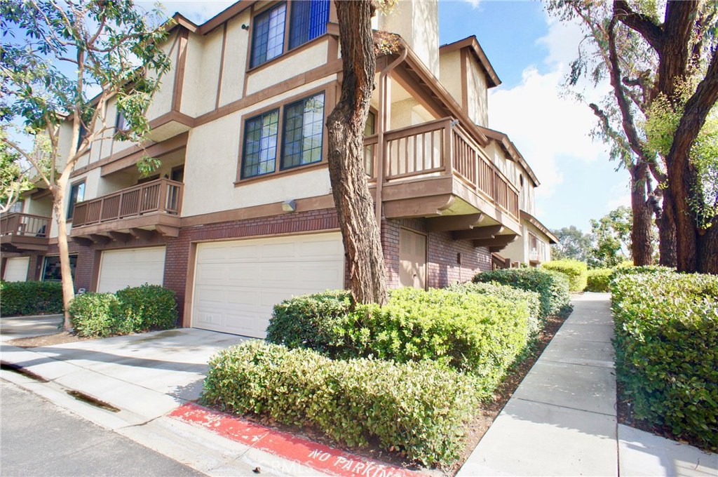 MORE PICTURES COMING! Acacia Park is a private gated community centrally located in Garden Grove. Walking distance to Historic Downtown Main st, Garden Grove Civic Center, Great schools and plenty of outdoor areas. This END UNIT townhome style condo has 2 master bedrooms, walk in closets, loads of natural light, and 2 private covered balconies from the main living areas. Ton's of pantry storage in the eat in kitchen nook. The 2 car garage has been wired with 220v for electric vehicles. MORE PICTURES COMING SOON.