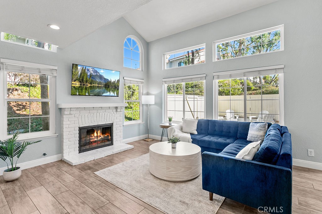 Available August 6 - September 21, then October 3 onward! This beautifully updated FURNISHED 3-bedroom, 2.5-bathroom townhome with a loft offers a perfect blend of comfort and style. Ideal for relocation, temporary housing, or simply enjoying all that Rancho Santa Margarita has to offer, this home is designed to impress. Step into the modern open-concept living area, featuring tasteful furnishings and an updated kitchen with stainless steel appliances and ample storage. The large backyard patio, complete with a cozy firepit, is perfect for relaxing or entertaining. On the main level, you'll find a convenient powder room and direct access to the 2-car garage, which includes in-home laundry. Upstairs, a versatile loft space serves as a second living area or office. The primary suite boasts generous closet space, a private ensuite bathroom with dual vanities, and serene backyard views. Two additional bedrooms feature thoughtful setups: one with a bunk bed and the other with a Murphy bed and desk, providing flexibility for guests or work-from-home needs. Community amenities include a pool and access to the scenic Rancho Santa Margarita Lake with its one-mile walking path, nearby shops, and restaurants. This stylish home is ready to welcome you—schedule a tour today! Rent is $4950-5500 per month with a Cleaning Fee of $450. Tenants pay for any gas and electric overages above $100 per month.