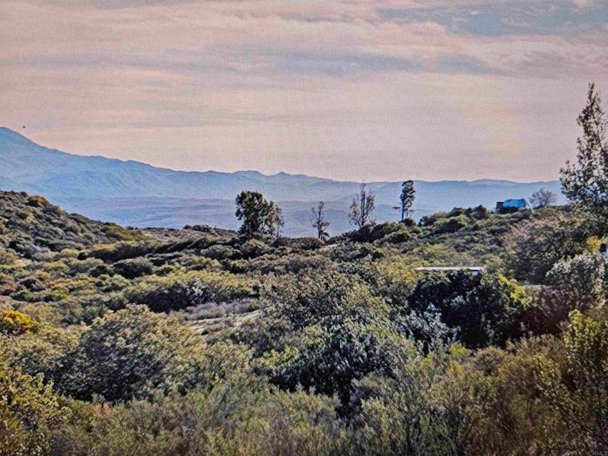 Incredible opportunity to own a 10 acre parcel surrounded by natural beauty and views.   This property is the one to build your dream home.  this can be your own private ranch where you can have your horses, barns, workshop or plant trees and gardens.      Country living with easy access to town, schools and shopping  Additional parcels also available