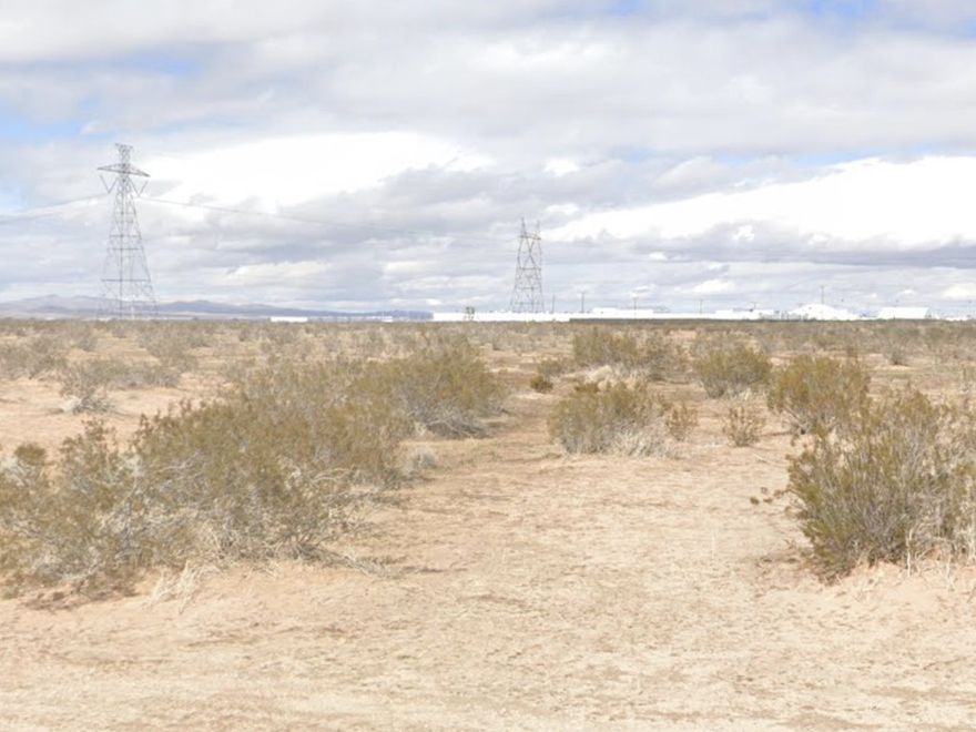 Located in a high-growth industrial corridor, this 10-acre parcel is zoned Light Manufacturing (LM), supporting warehousing, self-storage, contractor yards, and cannabis cultivation. Key infrastructure, including water and sewer are nearby, minimizing development costs and expediting project timelines. The property offers access to Highway 395, Air Expressway, and Highway 18, ensuring efficient transportation routes to Interstate 15. It is also close to Southern California Logistics Airport (SCLA), a major distribution hub.  An excellent investment for developers and industrial operators seeking a strategic location with strong growth potential. APN: 0455-052-11-0000. Buyer to verify zoning utilities and any other aspects of property.