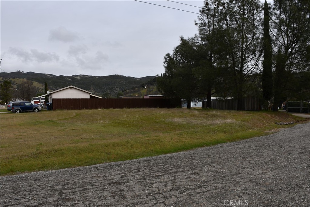 Ready to build! Water meter already installed and is a big money saver! This is a very sought after neighborhood. Rural and quiet community. Luxury of being close to Clearlake and Indian Valley Reservoir. The land also comes with a key to Helen Mitcham Campground. You will be close to Cache Creek Winery and the HWY. This property will be a great investment!