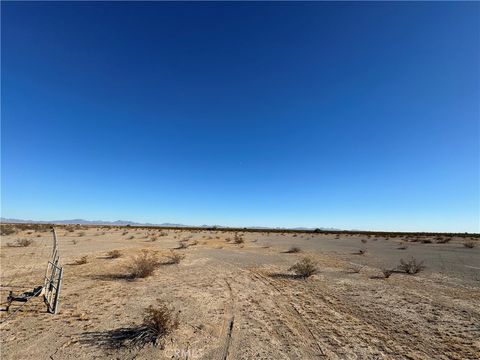 Photo of 0 Megin Ave, Blythe, CA 92225 (MLS # SW24230295) Photo of 0 Megin Ave, Blythe, CA 92225 (MLS # SW24230295)
