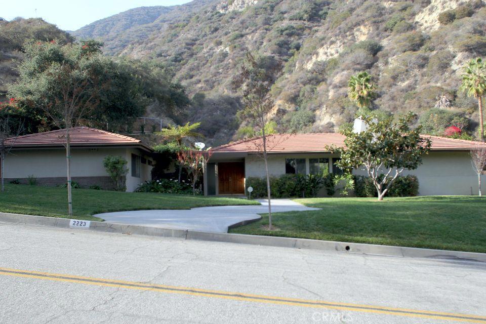 Fabulous Mid Century modern ranch style home located at the top of Highland Oaks in Award Winning Arcadia Schools. Great private , quiet neighborhood with stunning views and cool Canyon breezes. There are always various organic fruit trees at the back yard. This house have 3 bdrm 2 bathrooms with a nice open floor plan, a living room with fireplace, family room, dining area, nice front court yard and back with pool. Newly updated amenities: Central AC, bathrooms, led recess lights, solar panels, electrical panel box, alarm system, low E2 Windows and sliding patio doors, dark wood floor/ marble/ tiles through-out house , Viking kitchen appliances, and pool. This house is a gem-Must See!