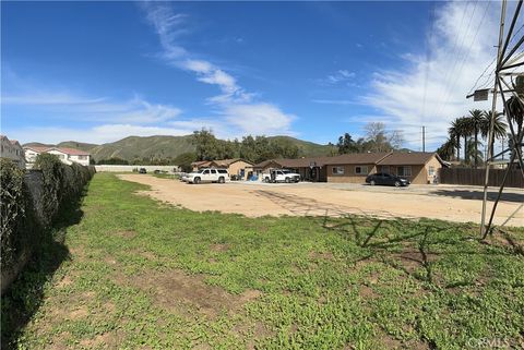 Photo of 9085 Bellegrave Avenue, Jurupa Valley, CA 92509 (MLS # DW24160309)