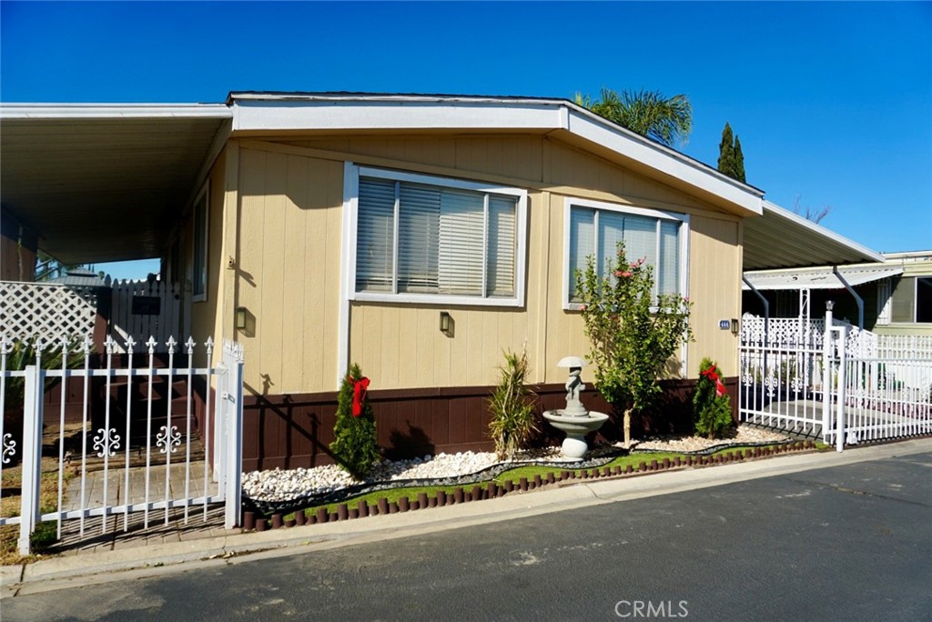Welcome to this spacious manufactured home located in the heart of Riverside, CA. Just minutes away from downtown, scenic hiking trails, top-rated restaurants, and grocery stores, this home offers both convenience and lifestyle. 2 Bedrooms, 2 Bathrooms, 2 additional rooms ideal for extra living or workspaces. Includes carport space for 3-4 vehicles. All-Ages Park: Perfect for families and individuals of all stages of life. Amenities includes a ballroom, two pool sites, a gym, playground, and laundry room. Don't miss this fantastic opportunity to own a home in a community that combines great location and desirable amenities.