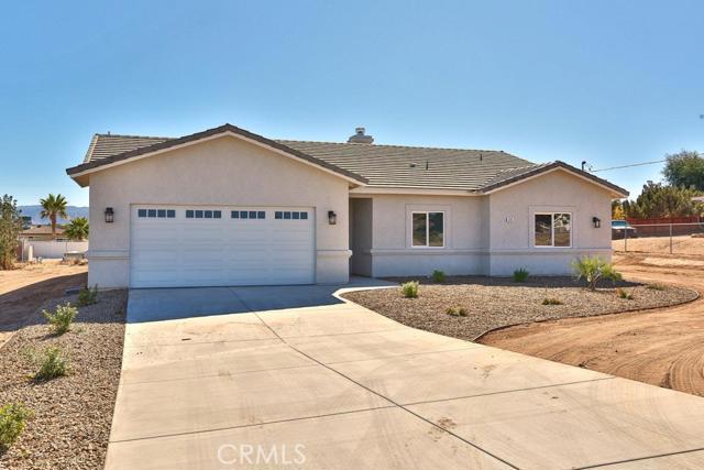 Brand NEW home that has front PROFESSIONAL LANDSCAPING, FULLY FENCED, attached 2 car garage, tile roof, stunning wood looking tile plank floors, tall clean white baseboard, large open floor plan with beautiful fireplace, large kitchen with GRANITE COUNTERS, STAINLESS STEEL APPLIANCES, large white subway tile backsplash & walk-in pantry. 3 bedrooms, 2 baths and check out the master bathroom!...it has dual sinks that are under-mounted the gorgeous white granite with grey veins, beautiful lights and I LOVE the shower! Floor to ceiling tile with cut out and large thick glass door! Beautiful hardware, ceiling fans in every bedroom, INDOOR laundry room, under roof STUCCO covered patio with great views!