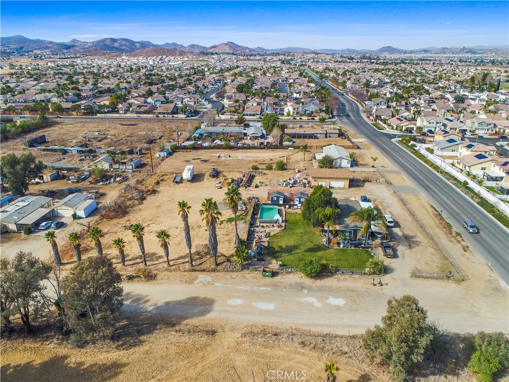 30525 Old Windmill rd features a 1,740 sq ft 2 bedroom 2 bathroom 433A certified Manufactured Home on a permanent foundation built in 1979 & a large Barn on just over 1.5 acres located in the "Community Core" of Menifee's Economic Development Corridor. This large lot has development potential & the neighboring properties, 30581 Old Windmill rd, 30620 Old Windmill rd & 30640 Old Windmill rd & 30645 Old Windmill rd are listed for sale as well.