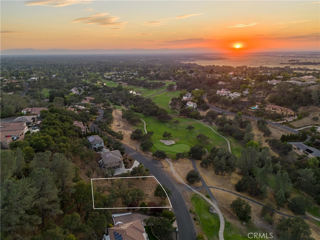 Luxury living at its finest! Welcome to the private, gated golf course community, Canyon Oaks. Come for the golf, stay for the lifestyle. As you drive through this neighborhood you will find custom built homes, pristine grounds that are meticulously maintained, and some of the most incredible views Butte County has to offer. This property is nearly a half acre with a mild rolling slope, located across the street from the course, and one of the last premium lots available in this community. All utilities are ready to be connected to in the street. Canyon Oaks is conveniently located just a few short miles from downtown Chico, shopping, restaurants AND steps away from beautiful Bidwell Park where you can enjoy mountain biking, swimming, hiking, and more. Canyon Oaks also offers its own private golf course, restaurant & bar, banquet hall and pro shop. Bring your contractor and build that home you've been dreaming of. Call today for a private tour.