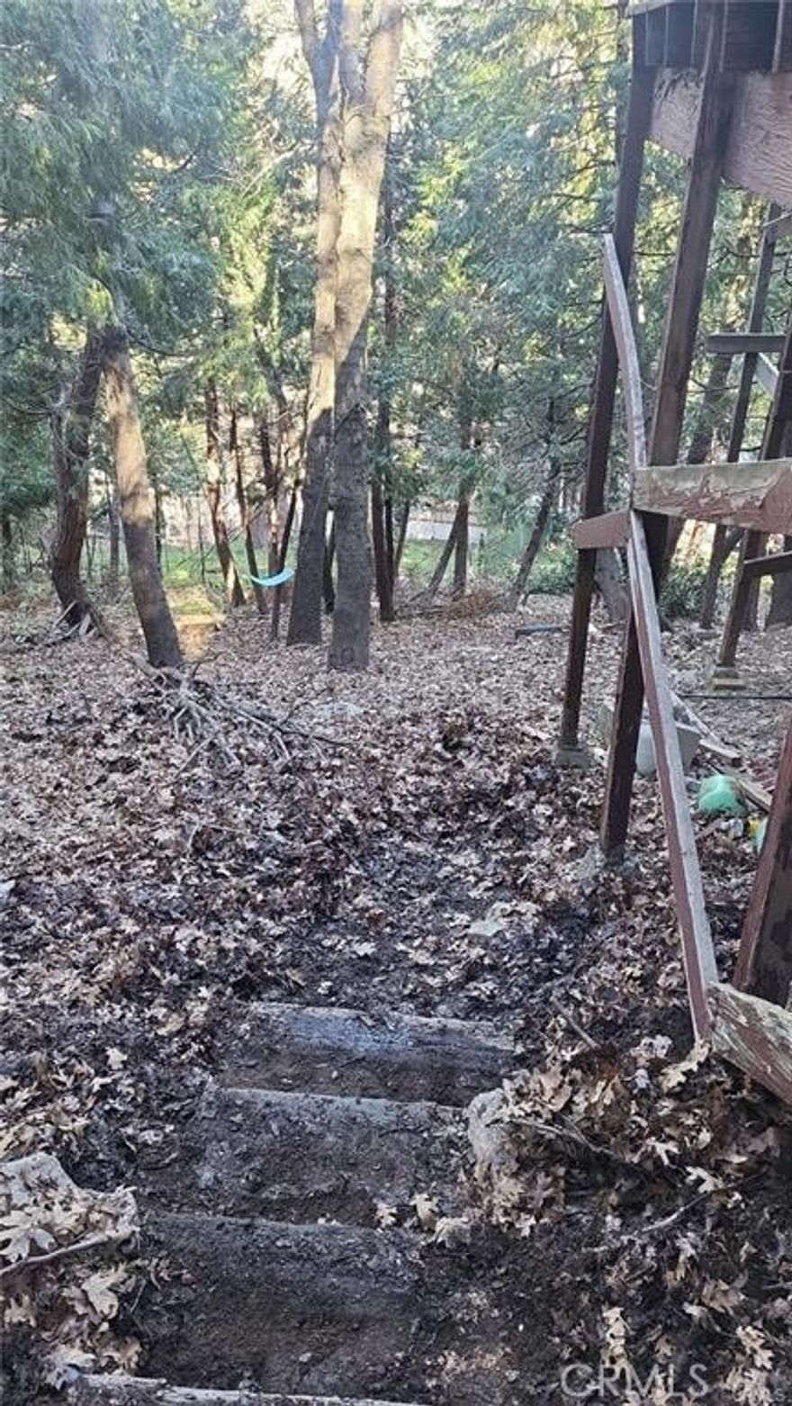 Back on the Market and reduction in selling Price!!! 4,988 Sq ft vacant lot with a downward slope in a serene forest neighborhood setting.  Less than a mile from Lake Gregory.  Street access from the top.  Buyer and Buyers agent to perform due diligence regarding utilities, zoning, permits, lot size, etc. Seller is VERY MOTIVATED!