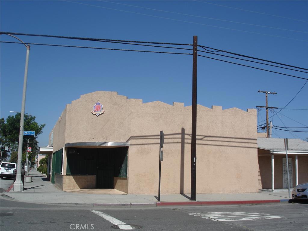 across police station, Cabrillo High School, close proximity to churches and post office. cluster of small businesses around. long term tenants. one bedroom with bath and kitchen attached to first unit, (2000) and is permitted only as an extension of subject unit.