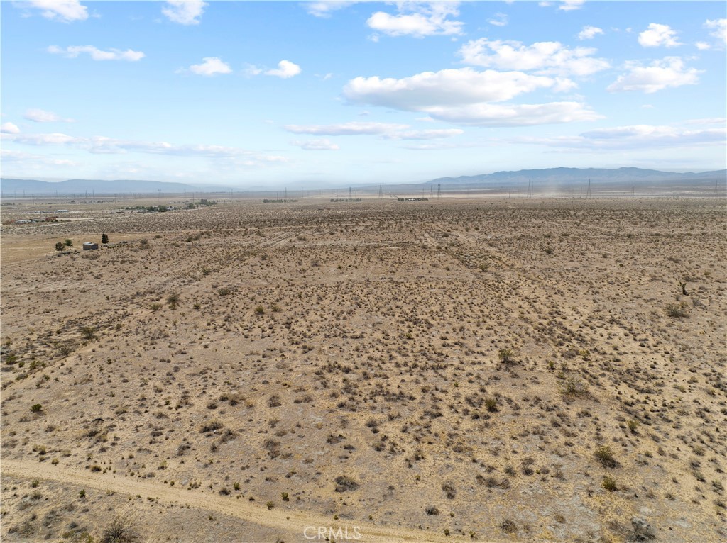 LAND LOT-PRIME LOCATION 2.5 acres in a highly desirable area w/road access and neighboring utilities. This one is a winner for sure. Build now or save the land for alter time. Hurry, Grab it before its gone.