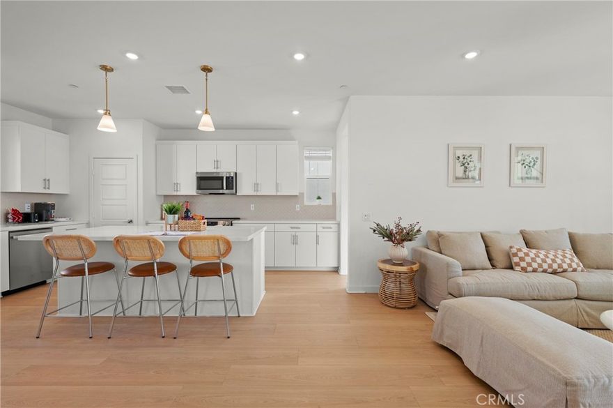 We welcome both short-term and long-term lease options. The yard is currently under construction and will feature lush greenery and a fire pit, perfect for enjoying a resort-style lifestyle.



Experience modern living at its finest in this brand-new, stunning single-family home. With 4 bedrooms, 3.5 bathrooms, and an expansive floor plan, this immaculate property offers features that captivate and inspire. Yard landscaping is currently underway. 



Private Outdoor Spaces: Enjoy the tranquility of a private front yard and a charming balcony, perfect for your morning coffee or unwinding with an evening drink. 



First-Floor Convenience: The first floor hosts a bedroom with an ensuite bathroom, ideal for guests or family members seeking privacy. A convenient laundry room and an attached two-car garage add to the ease of living. 



Second-Floor Luxury: The heart of the home shines on the second floor, where the modern kitchen awaits with sleek cabinetry, quartz countertops, a large island, and stainless steel appliances—a chef's dream. The open floor plan connects the kitchen, living room, and dining area, creating an inviting space for entertaining. A powder room adds extra convenience. 



Master Suite Retreat: Upstairs, the master bedroom is a luxurious retreat, complete with a spacious walk-in closet and an elegant en suite bathroom featuring dual sinks and an oversized shower. Each bedroom is thoughtfully designed with recessed lighting for added comfort and style. 



Family-Friendly Location: Perfect for families, this home is a short walk from the brand-new clubhouse and community amenities, making it easy to enjoy everything the neighborhood has to offer. 



Community & Lifestyle: The community boasts resort-style amenities, including pools, a community garden, clubhouse, lagoon pool, fitness centers, nature house, event barn, sports parks, parks and trails, farms, and more. Conveniently located near shopping, dining, entertainment, and major freeways for easy commuting.