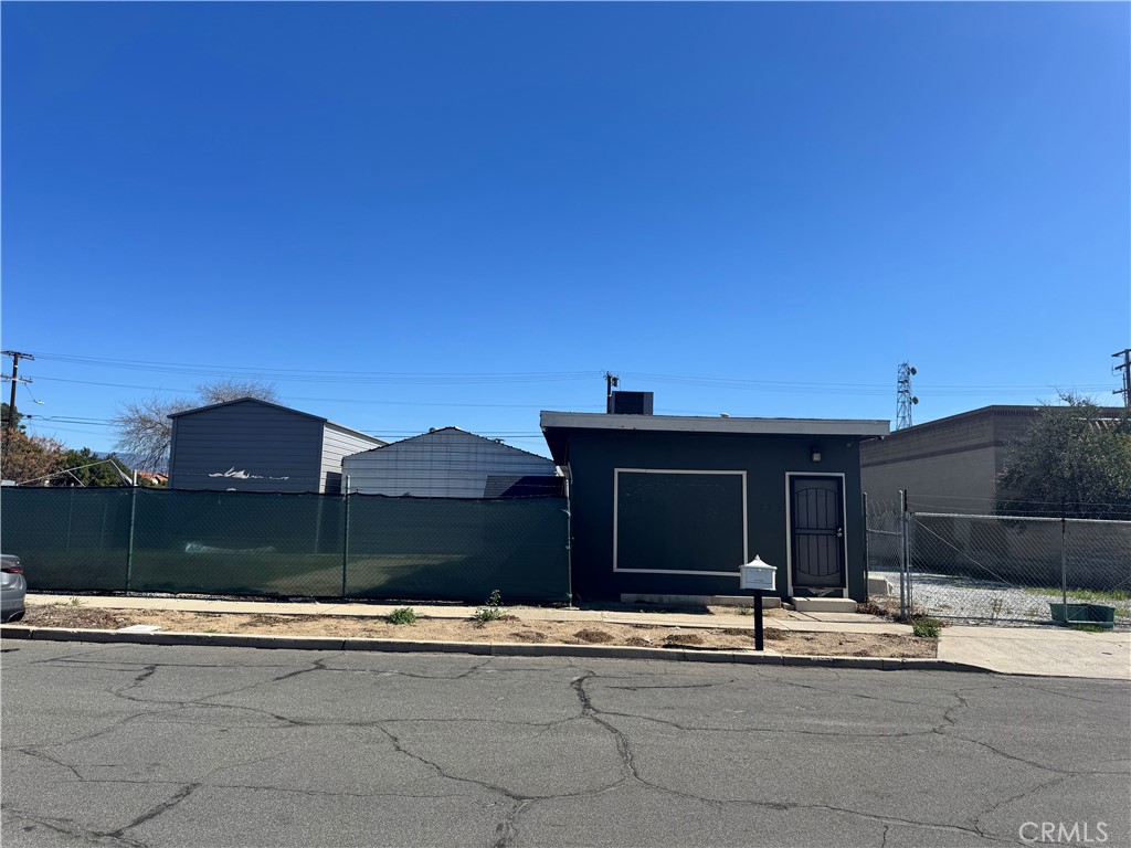 Excellent opportunity in the city of Rialto! Located at 223 S Olive Ave, this commercial property features a spacious 10,500 sq. ft. lot with great potential for redevelopment. Currently utilized as an office with a mechanic garage in the back, it offers versatile possibilities for investors or business owners. Be sure to check with the city of Rialto appropriate department for property use permits. Property also has two metal structures/storages approximately 25'x30. Don't miss out on this prime location!