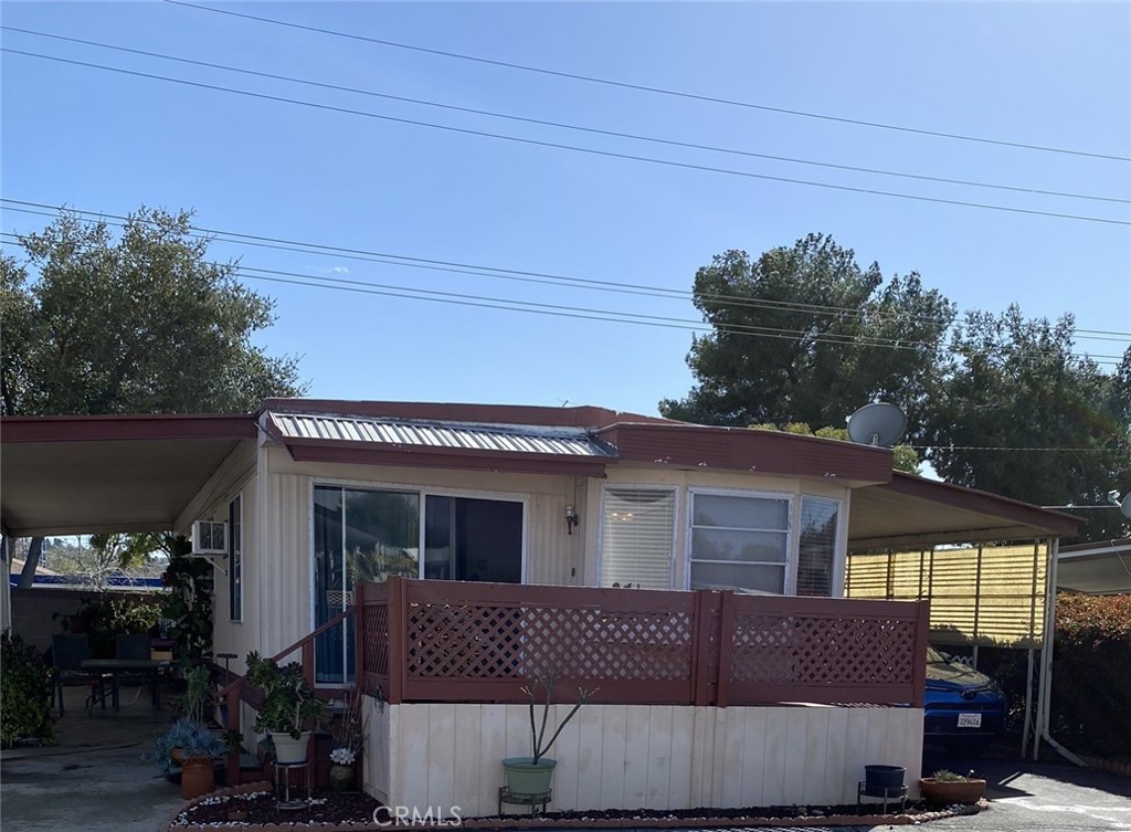 This mobile home is located in Charter Oak Mobile Home Estates. The Senior Park (55+) is conveniently located close to 3 shopping centers, a movie theate, and restaurants. The park offers a spacious club house with a gym, reading room, TV room, Pool and Spa. If you are interested in social activities the park offers those as well. Easy freeway access to 57 and 210. The downtown area offers a Public Library and a Senor Center which offers many activities and excursions.
This home is priced to sell. You will not find a mobile home in this area for this price. The unit needs a little TLC but well worth the price.