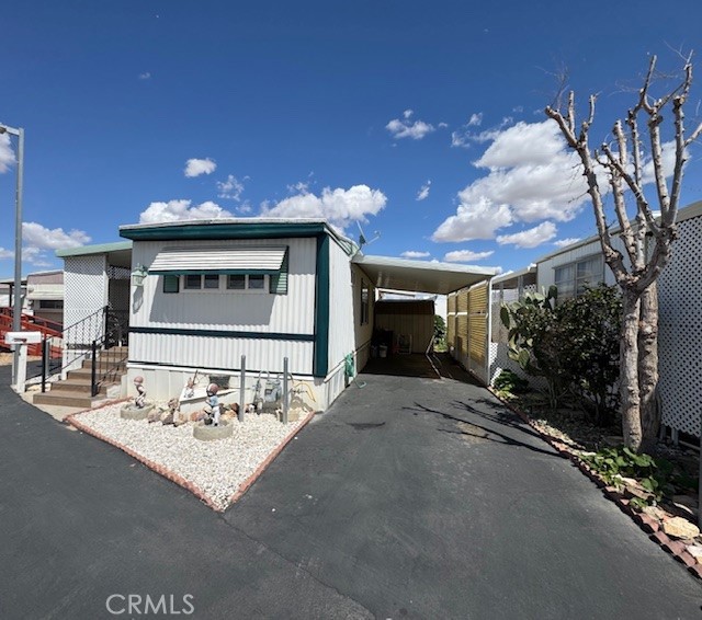 Welcome to The Greenbriar; This 2 Bed, 1.5 Bath Home, Conveniently located off Palmdale Rd & El Evado Rd in Victorville. This home features a Split Floor Plan, NEW Vinyl Flooring! Upgraded Windows, Modern Lighting, and an Open Kitchen Layout—Perfect for everyday living. Enjoy Relaxing on the Covered Patio with Brand-New Carpet, and Appreciate the added bonus of on-site laundry in the shed. Located in a peaceful 55+ Community with LOW SPACE RENT This is an Opportunity you Don’t want to miss.. Ideally located off Palmdale Rd & El Evado Rd. You’ll Love the Convenience of Nearby Shopping, Restaurants, and Quick Access to I-15 FWY and HWY 395. Schedule your Showing Today! *OWNER FINANCING AVAILABLE*