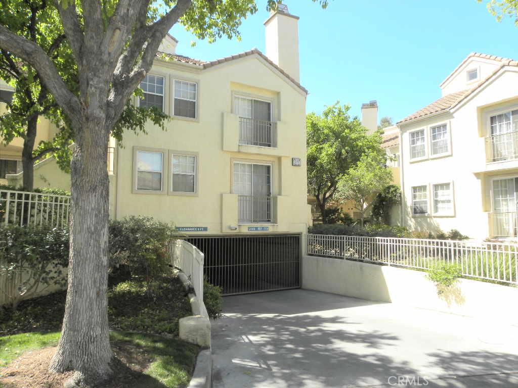 Don’t miss this opportunity to own a great Siena Villa condo in the heart of Valencia. Popular double master lower unit with two full baths, large walk in closets, fireplace, wood type flooring, upgraded counter tops, newer water heater and stackable washer and dryer. There is a large patio with two sitting areas accessible from the bedrooms and living room. There is parking for two cars and a storage locker in the enclosed garage area. The home is situated in one of the best locations in the back of the complex overlooking the beautiful landscaped grounds. Some of the amenities of the Siena Villa resort style living is three pools and spas, tennis court, car wash area all within walking distance to the parks and Valencia’s Paseo (pedestrian/bike trails) system. The home owners association (HOA) covers water, trash, security patrol and common area landscaping. This home is also within walking distance to Whole Foods/Starbucks shopping center and the Westfield mall with great shopping and restaurants and much more. Come see why this is the place to call home today.