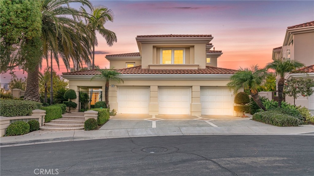 Rare on the market! Nestled at the top and heart of the prestigious, 24-hour guard-gated Turtle Rock Summit community, this luxury estate offers panoramic city and mountain views and is truly a homeowner’s dream. Its prime location provides amazing views, access to top-ranked schools in Orange County—both public and private—ranging from preschool to high school and university. The home features a fantastic floor plan with soaring ceilings in the living and dining rooms, and all bedrooms with en-suite bathrooms. One bedroom is conveniently located on the first floor, ideal for multi-generational living or guests. A loft on the second floor and three fireplaces add to its charm. The property ensures complete privacy, facing the community greenbelt and offering unobstructed city views, with no neighbors in front or behind. A gated front yard enhances both security and privacy. Walk through the rose archway to discover mature fruit trees and a large BBQ island—perfect for entertaining. The side yard offers a spacious area for activities like mini-golf or a basketball court. The community also features a large swimming pool, a clubhouse, and additional amenities.