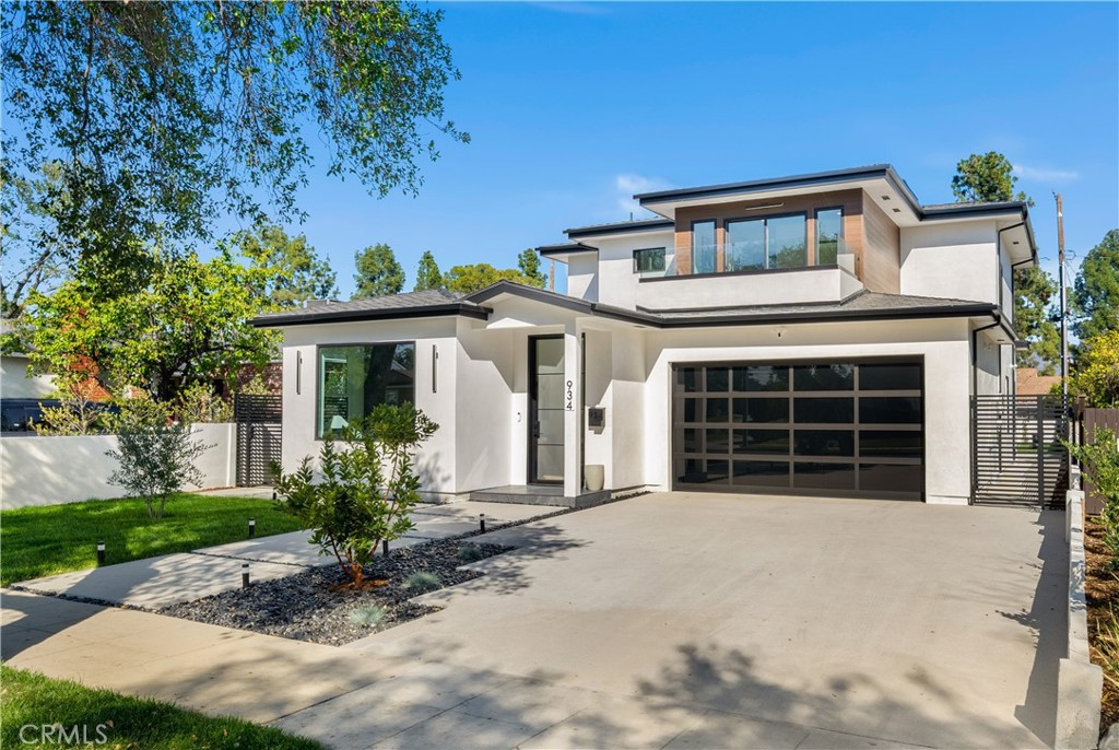Discover modern luxury in this Brand-New, meticulously crafted home. Designed with elegance and functionality in mind, this four-bedroom, three-bathroom home welcomes you in with distinct architectural features that will make a lasting first impression. A grand entrance to the formal Living Room with a floor to ceiling stone feature and oversized picture window brings in brightness and warmth. The heart of the home is the expansive open concept Kitchen, Dining and Family room area, perfect for everyday living and comfortable entertaining. The Chef’s Kitchen makes a statement with high-end appliances, Taj Mahal quartzite stone, an abundance of cabinetry, hidden walk-in pantry and nearby wine closet to showcase your collection. Upstairs you’ll find the Primary Suite complete with a spa inspired bathroom that features a soaking tub and oversized shower, private balcony, lounge space, and a walk-through closet. Seamless indoor-outdoor California living is ready to be enjoyed with a spacious outdoor patio and BBQ area, ideal for hosting gatherings in style. With impeccable craftsmanship, premier finishes and thoughtful floor plan, this home is waiting for you to make it your own!