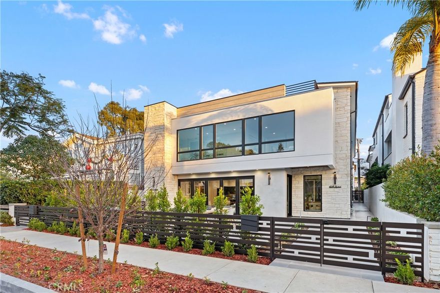 A truly exceptional masterpiece boasting a very rare 45-foot lot on 400 Block of Flower Street. This brand-new construction is a testament to Organic Modern design, seamlessly blending natural elements with contemporary aesthetics.

As you step inside, you will be greeted by ample natural light pouring in through bifold windows that effortlessly open to reveal a sprawling front patio highlighted with a beautiful firepit and generous seating area, providing an idyllic space for relaxation and entertaining. The great room features a striking modern fireplace with exquisite porcelain tiles and custom wood panels, creating a focal point of refined elegance. The heart of the home, a Porcelanosa two-tone custom kitchen, fully crafted in Spain, is a culinary enthusiast’s dream, equipped with top-of-the-line Miele appliances and integrated espresso brewing system, and custom organization system. For the wine connoisseur, a dedicated storage is thoughtfully incorporated. 
Entertain effortlessly in the inviting courtyard that seamlessly connects to the kitchen and dining area, facilitating a delightful flow for your al fresco.
A conveniently located ensuite bedroom/office on the first floor offers versatile living space for your guests or remote work from home. Extra storage area and luxurious powder room for your guests complete the first level. Ascend to the second floor, where the primary suite awaits, complete with a lavish bathroom embellished with luxurious Walker Zanger tiles. The suite boasts large windows that flood the space with natural light, automatic roller shade system for your privacy, gorgeous custom walk-in closets, and an enclosed patio providing an intimate outdoor oasis. Two additional ensuite on this level offer comfort and privacy, while a dedicated laundry room adds practicality and functionality.
The extra-large rooftop is a crowning jewel, offering panoramic views of Corona Del Mar village, city lights, breathtaking sunsets, and picturesque Spyglass hills. This space is designed for year-round both relaxation and entertainment, featuring a covered area with a multi-color flame modern fireplace finished with beautiful stone detailing and ample seating area. With a generous and RARE FOUR-CAR PARKING SPACE, including 2 car garages, 424 Orchid Avenue epitomizes the pinnacle of finest modern luxury living in Southern California, where you can enjoy prestine beaches, world renowned shopping and dining destinations, all in just moments away.