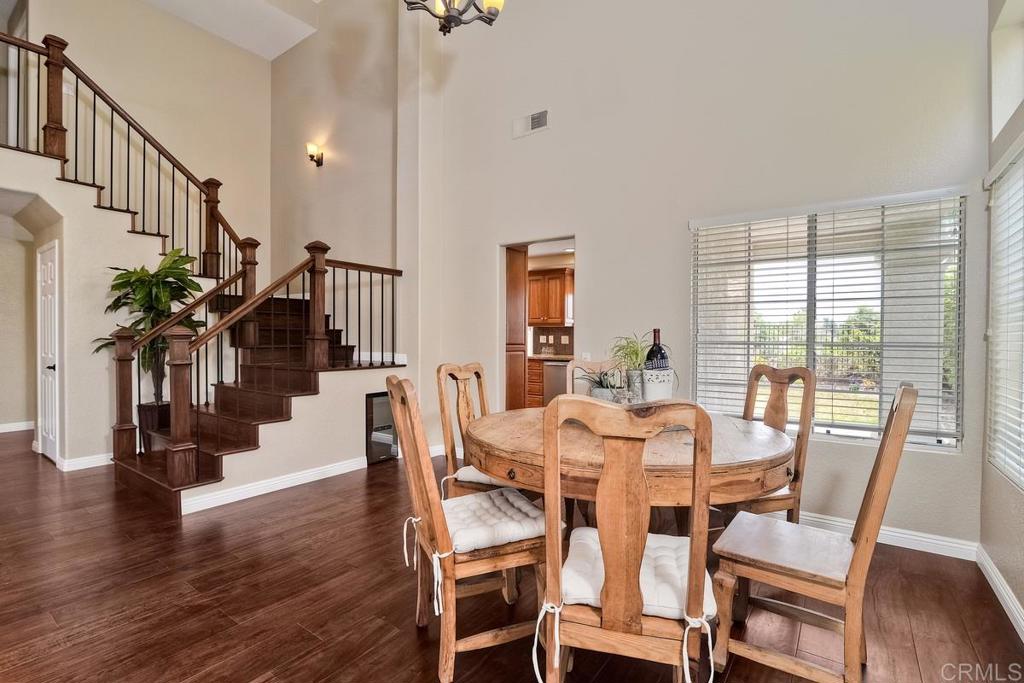 Welcome home! This beautiful 4 bedroom, 3 bath home has it all! Upgraded floors throughout. Kitchen has been fully remodeled with brand new stainless steal appliances, custom back splash. Bed and bath on the 1st floor! Walk upstairs through the french doors into the master retreat with balcony with views of the canyon! Absolutely stunning master bath with free standing tub. The backyard has been well manicured and has a beautiful spa, built in BBQ and fireplace, perfect for entertaining!