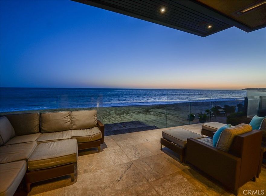 Breathtaking panoramic ocean views surround this rare newer construction home on the sand in the exclusive gate guarded private community of Capistrano Beach. Thoughtfully designed by Carol McMahon and built with the highest quality of craftsmanship this gorgeous multi-level 4082 sq ft home is ready to hand you the key and enjoy for the summer. Rarely used and meticulously cared for since completion in June 2013 this custom home looks/feels like new with wide open floor plan and massive glass rooftop for natural light. Airy and bright, the stylish living spaces include a formal living room with tile framed gas fireplace and 70&#8221; TV, formal dining area, chef&#8217;s kitchen fitted with professional grade appliances and oversized center island with breakfast bar. The expansive master retreat includes sitting area, fireplace, spa-like bathroom, walk-in closet with custom built-ins and floor to ceiling windows with collapsing sliders leading to your private ocean front deck.