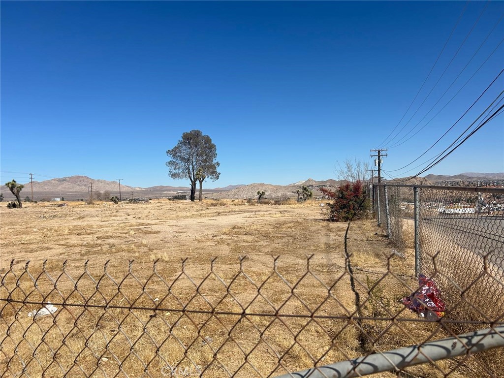 This 3.5-acre serviced lot near 7th Street is a prime opportunity for builders and developers. Water and electricity near by of the property its ready for construction. The elevated location offers stunning views of the city and surrounding mountains, making it ideal for your dream home. With easy access to major roads, shopping, and urban conveniences, this property combines scenic beauty and strategic positioning, making it a valuable investment in the growing city landscape.